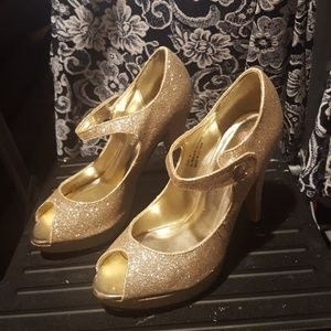Gold heeled open toe shoes